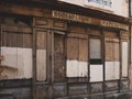 An old store closed with planks of wood